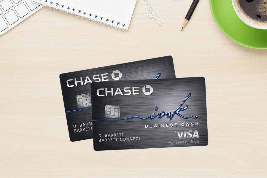 Two Chase Business Credit Cards ontop of a table.