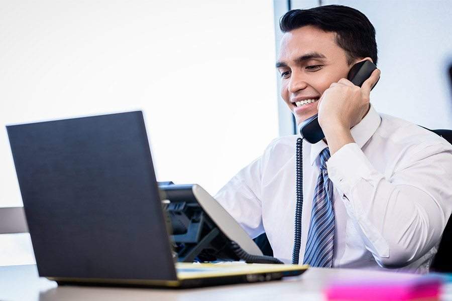 Businessman talking on phone.