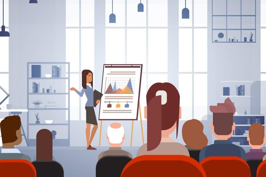 Vector image of woman presenting on in front of people.