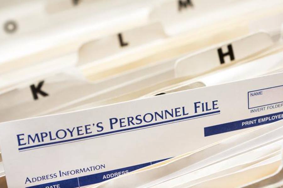 Personnel file organized folders.