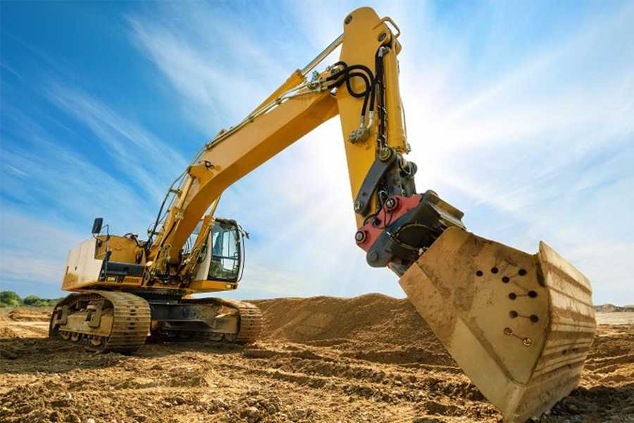 Excavator dig the trenches at a construction site