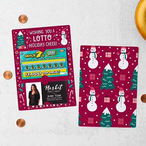 Gift tag with business card and lottery ticket attached that says, 