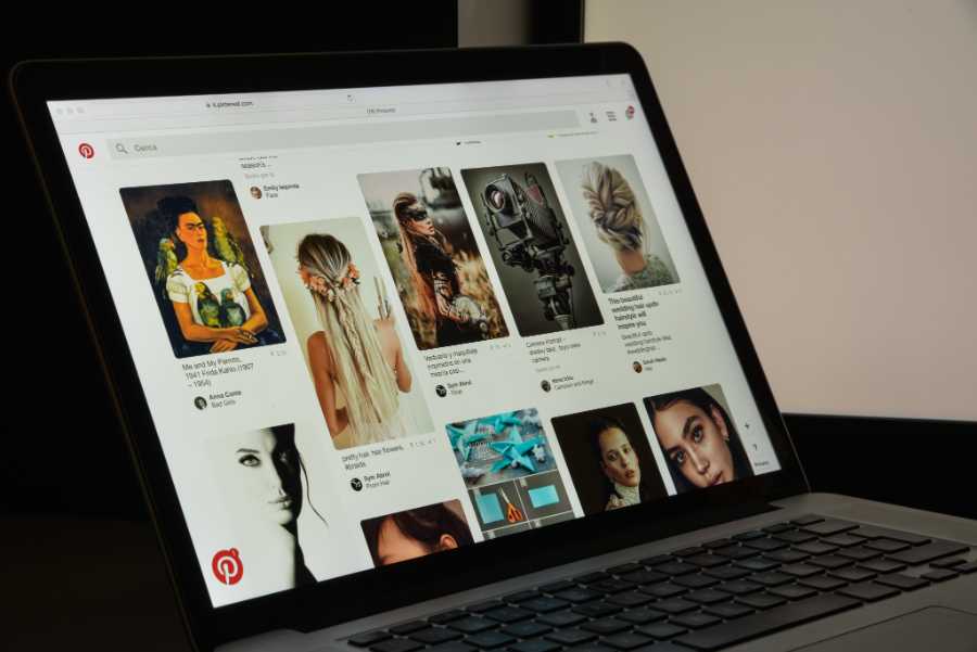 Showing Pinterest's page on a laptop screen.