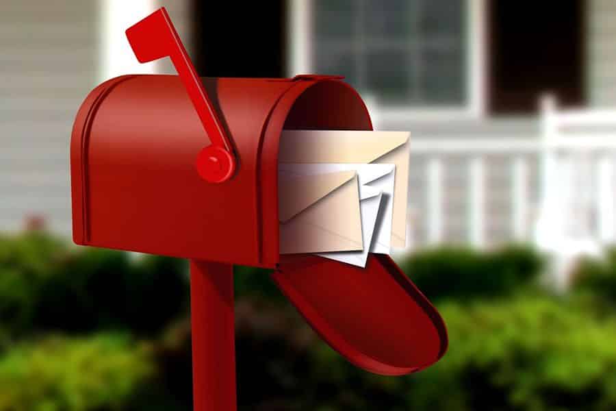 red mail box with mails inside