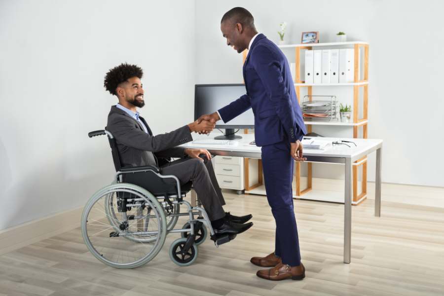 Businessman hired a man with disabilities.