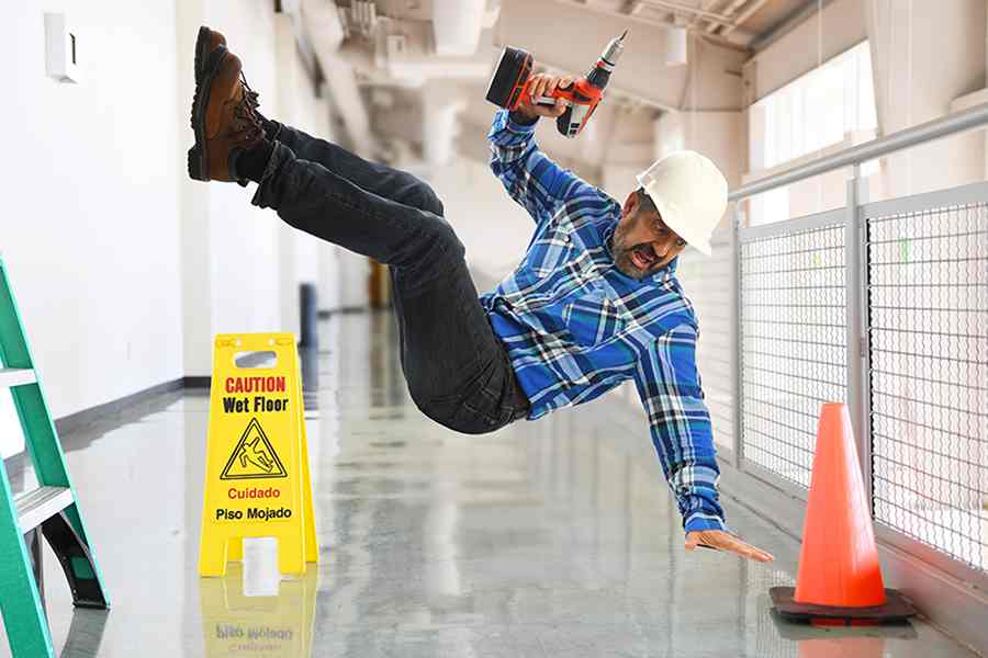 Worker falling from ladder.