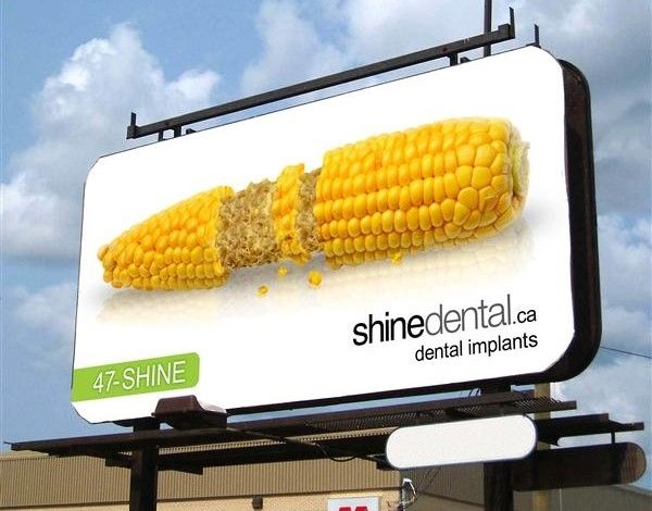 shinedental。ca广告牌广告的耳朵吃corn on a white background.