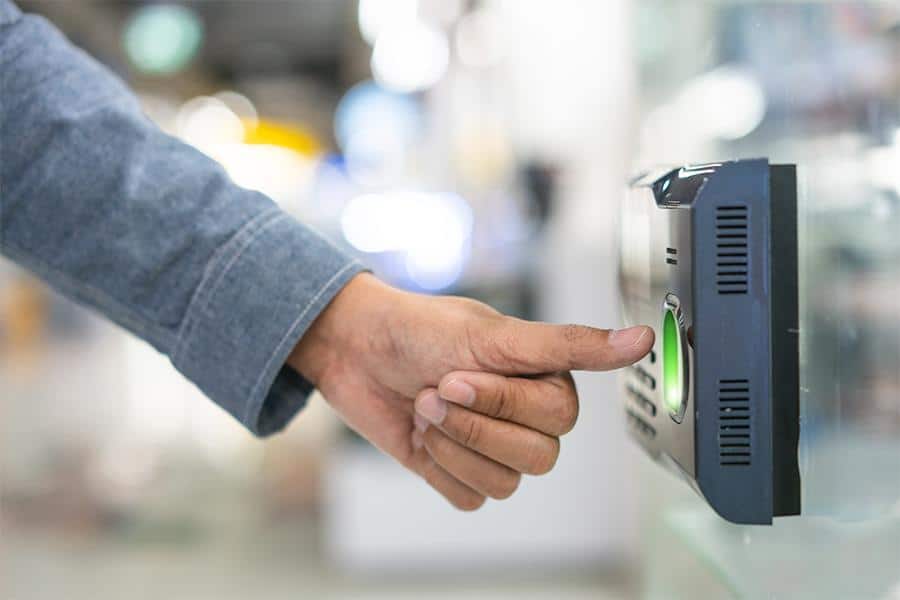 An employee scanning fingerprint.