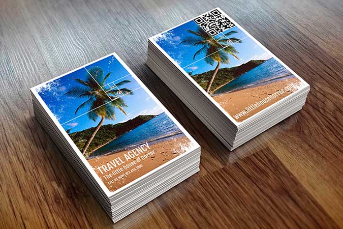 sample two-sided business card for a travel agency made by 4OVER4