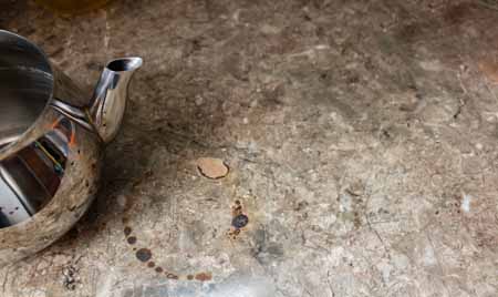 Example of tenant damage in the kitchen countertop.