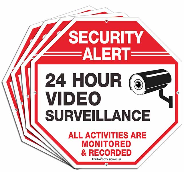 Octagonal security sign warning of 24-hour video surveillance.